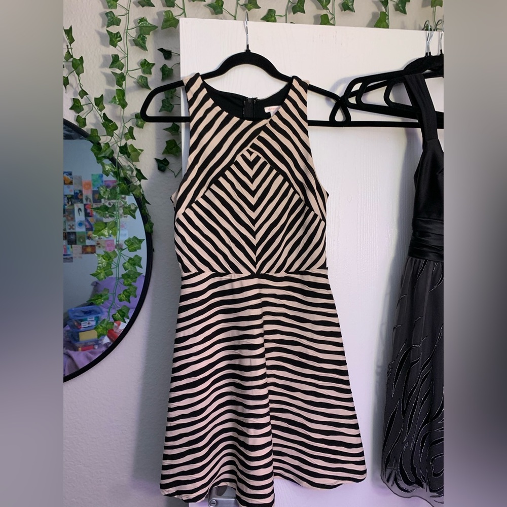 Super flattering asymmetrical design you'll love this dress